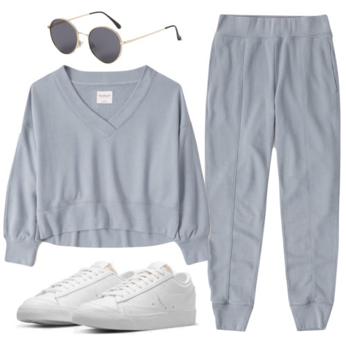 Casual Athleisure Outfit with slate blue joggers and matching sweater, white sneakers, aviator sunglasses