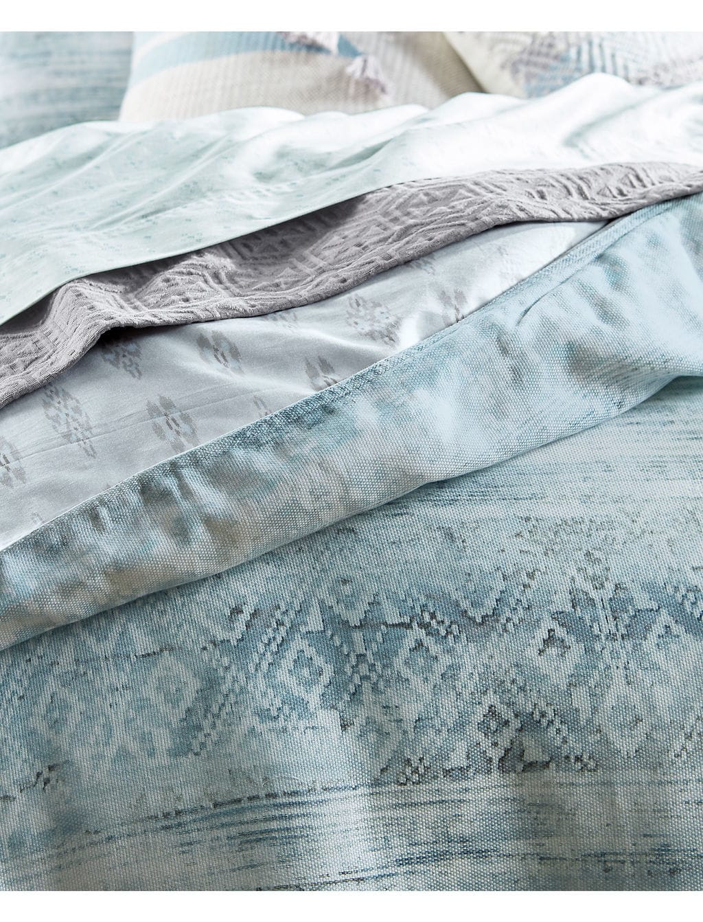 Cute dorm bedding - Lucky Brand's calm ocean blue cotton sheet set with light pressed dot patterns.