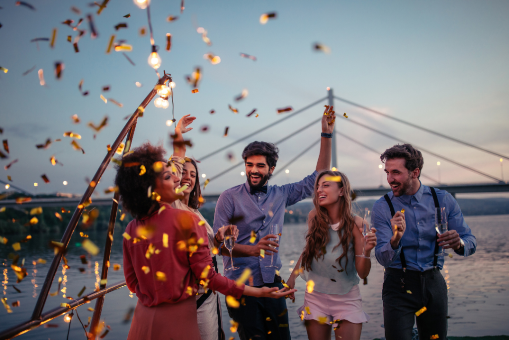 Friends celebrating a 25th birthday while traveling together